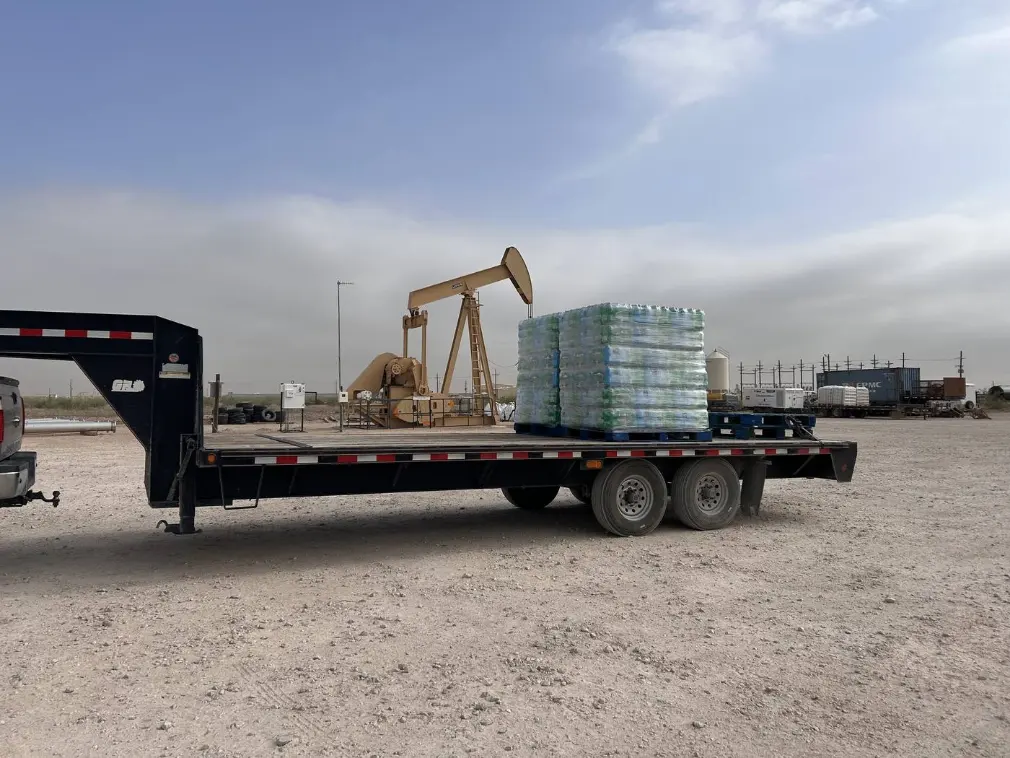 Water pallet delivered at an oilfield site